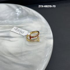 Red T gold ring with diamonds